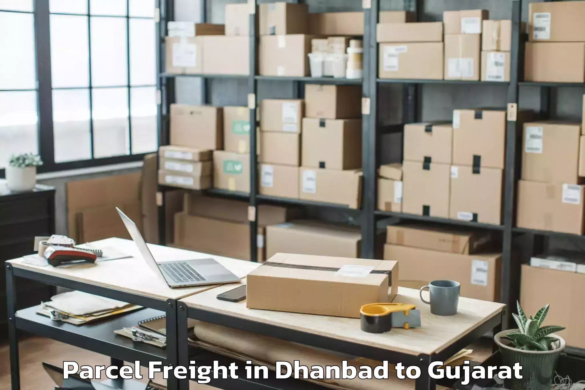 Book Your Dhanbad to Palanpur Parcel Freight Today